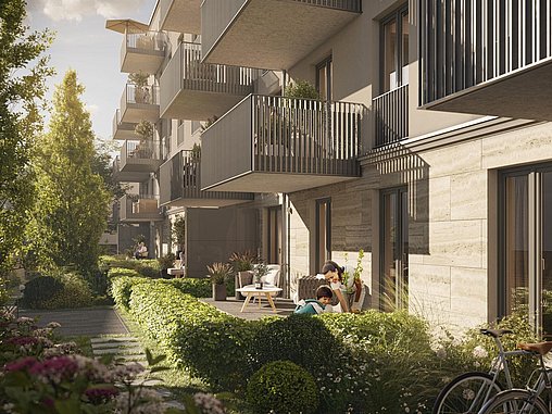 Modernes Wohngebäude mit ebenerdiger Terrasse und Fahrradabstellplatz in urbaner Umgebung.